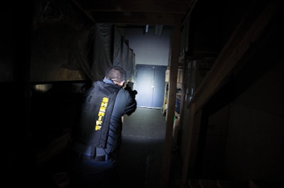 When conducting a search with a flashlight, you still face threats from areas that are not illuminated. (Photo: Edward M. Santos)