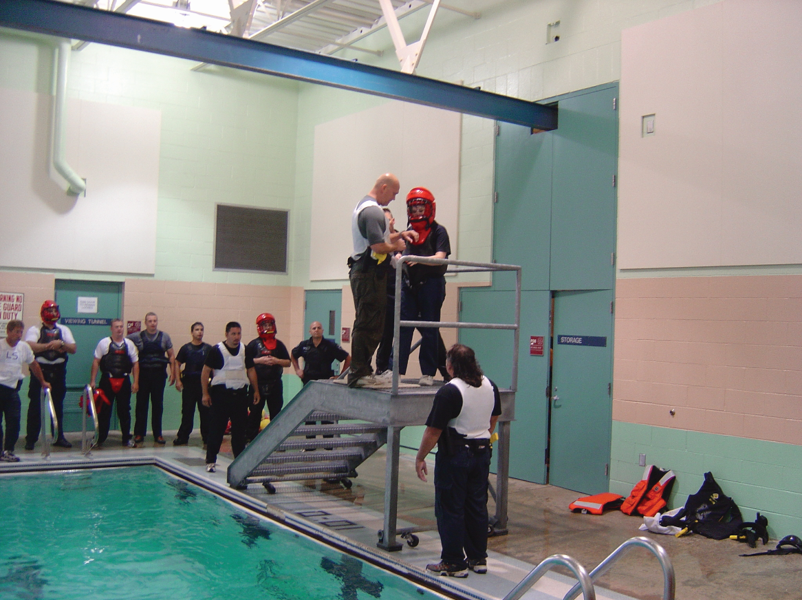 Training wearing full gear in the water will help officers prepare to swim with extra weight should they need to do so in the field. Photo by Dave Young.