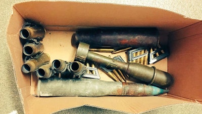 This box of aging military munitions believed to be from World War II was brought to the Dixon (IL) Police Department Tuesday. The department is now asking the public not to bring explosives to the station for disposal. (Photo: Dixon PD)
