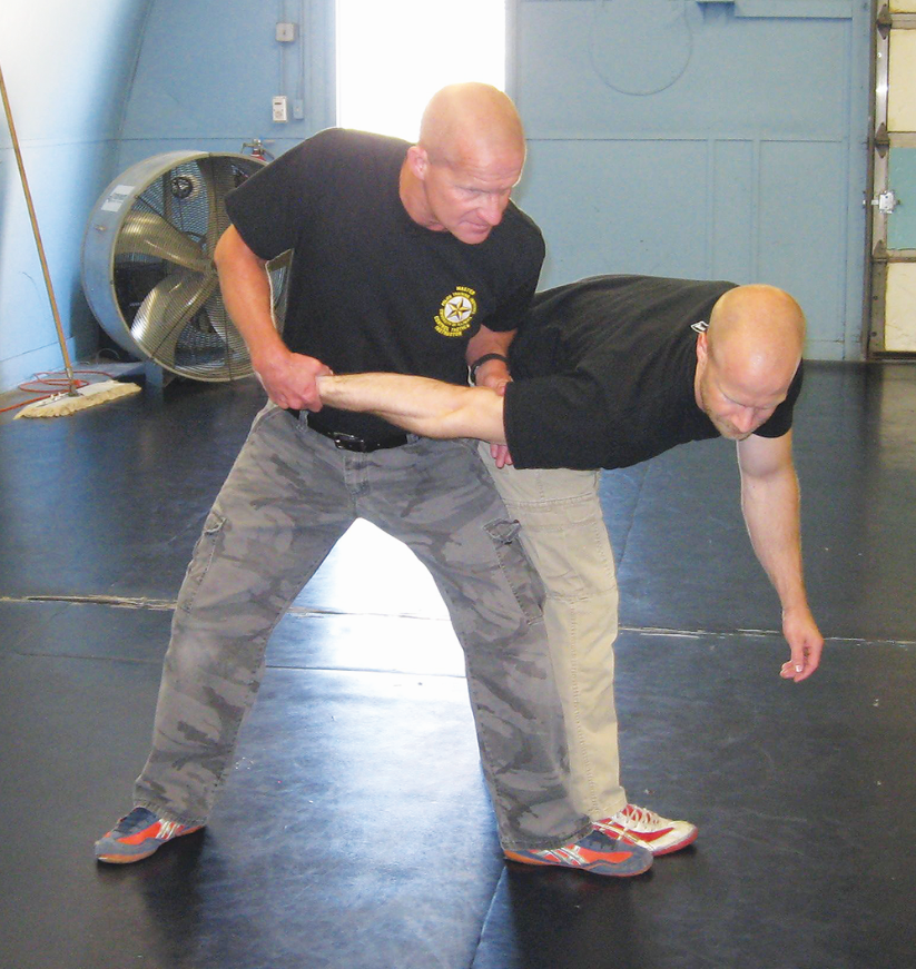 If the arm remains extended try a straight-arm takedown. Photos: Adalyn Schlosser