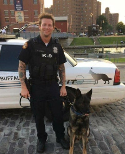 Buffalo Officer Craig Lehner with his K-9 'Shield.' Lehner went missing after a training exercise with the department's Underwater Recovery Team Friday. He is presumed dead. (Photo: Buffalo PD/Facebook)
