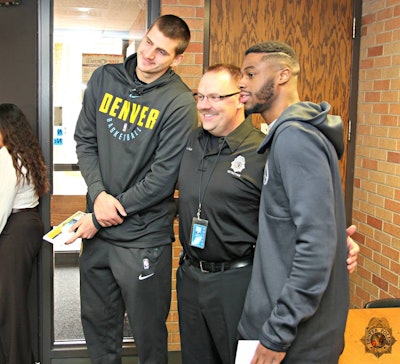 Denver Nuggets basketball players Nikola Jokic and Emmanuel Mudiay visited the Denver Police last week and brought lunch. (Photo: Denver PD/Facebook)