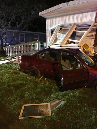 A suspect fleeing from an Oakland County (MI) Sheriff's deputy crashed into this mobile home Sunday. (Photo: Oakland County SO)