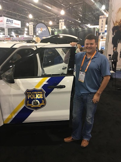 Philadelphia Police Officer Jesse Hartnett, who was shot in his vehicle in an ambush attack on January 7, 2016, shows the Hardwire armor kit on a Philadelphia Police vehicle. (Photo: Hardwire LLC.)