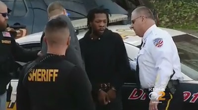 Rahmael Sal Holt arrives at the New Kensington Police Department. Holt, who is suspected of killing New Kensington officer Brian Shaw Friday, was captured by a law enforcement task force Tuesday morning. (Photo: KDKA Screen Shot)