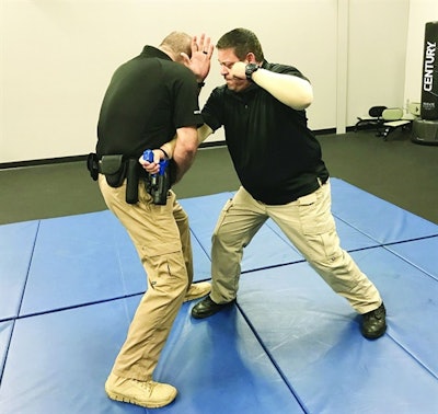 You can control your weapon using a power lock cross grab technique. Photo: Dave Young