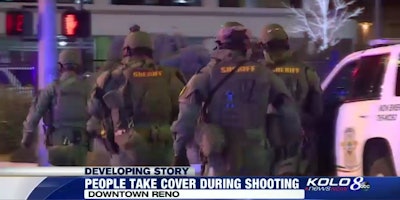 Washoe County Sheriff's deputies outside the Montage Condominiums in downtown Reno. A gunman reportedly took a hostage and fired into the street from the high-rise Tuesday night before he was killed by law enforcement. (Photo: KOLO TV Screen Shot)