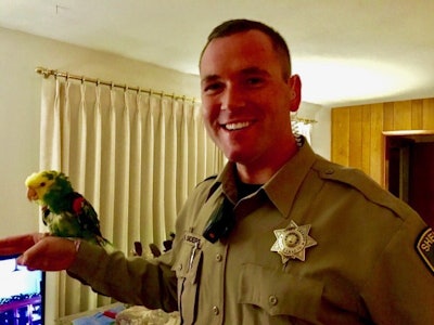 Deputy Hayden Sanders from the Clackamas County Sheriff's Office with his new friend Diego. (Photo: Clackamas County SO)
