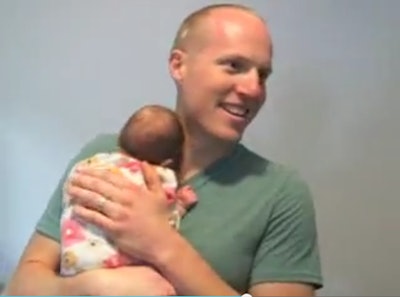 Albuquerque police officer Ryan Holets with baby daughter Hope. The baby was born to a heroin-addicted mother. (Photo: KTVZ/CNN screen shot)