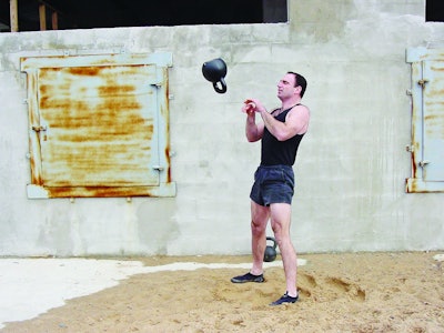 Jeff Martone of Tactical Athlete performs high-intensity kettlebell swing and catch exercises. Photo: Jeff Martone