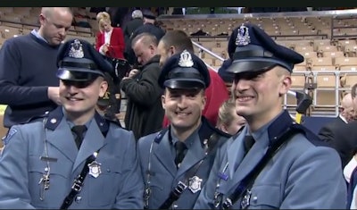 From left to right: Mark Weddleton, Stephen Weddleton, and Ross Weddleton at Ross' Massachusetts State Police Academy graduation. Their father, Sgt. Douglas Weddleton of the Massachusetts State Police, was killed in the line of duty in 2010. (Photo: WHDH Screen Shot)