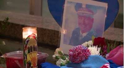 A memorial for Commander Paul Bauer of the Chicago Police Department was set up just steps from where he was killed.