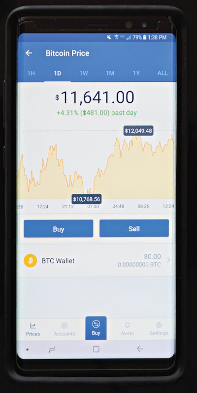 Coinbase is a popular app used to purchase Bitcoin. Photo: Aaron Strain