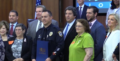 Coconut Creek Police Officer Michael Leonard was honored by the Broward County commissioners Tuesday for capturing the Parkland school shooting suspect. He said the honor should go to all of the first responders who 'had a role that day.' (Photo: Screen Shot from Sun Sentinel video)