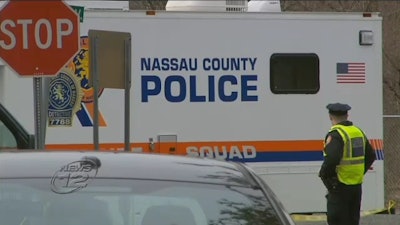 Nassau police say an officer fatally shot a bat-wielding suspect in Great Neck Monday morning following an apparent road rage confrontation.
