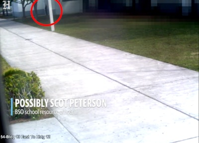 A surveillance video captured outside Parkland, FL's Marjorie Stoneman Douglas High School during the Feb. 14 school shooting was released Thursday. The video shows Broward Sheriff's Deputy Scot Peterson outside the school.