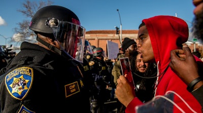 A protester abused California Highway Patrol Sgt. Ron Wade during a Stephon Clark shooting demonstration last week.