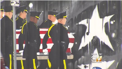 This mural outside a Dallas-area lounge honored five officers killed in the July 7, 2016, sniper attack. It was removed this week for a code violation.