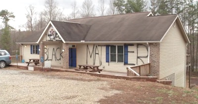 The Asheville, NC, lodge of the Fraternal Order of Police was vandalized Monday. (Photo: WLOS Screen shot)