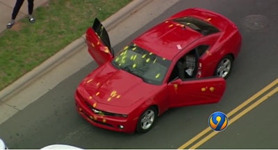 Four people were detained Wednesday afternoon after a paintball shootout between two cars that were speeding through the streets of Charlotte, NC. (Photo: WSOC screenshot)
