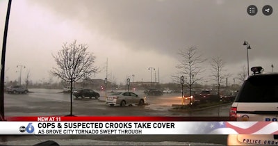 A video system in a patrol vehicle captured footage of the tornado in Grove City, OH, last week. During the storm, police, suspects, and the reported victim all sought cover in a store.