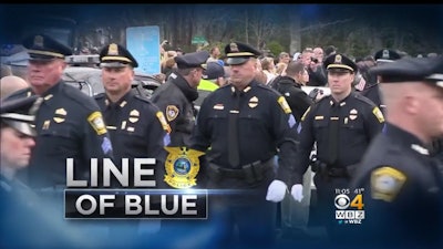 Thousands of officers from around the country attended the wake for Officer Sean Gannon, killed in the line of duty. Photo: WBZ-TV screenshot