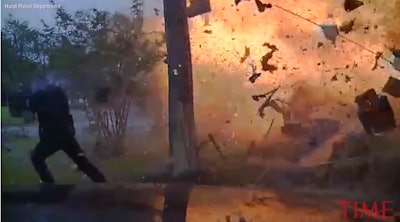 A Texas officer was almost caught in a house explosion. (Photo: Hurst PD/Time screenshot)