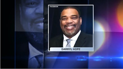 Det. Darryl Hope of the Dolton (IL) Police Department was shot during an attempted robbery outside his home Monday. One of the suspects may have been wounded when Hope returned fire.