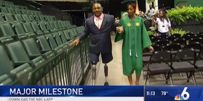 Maj. Carter walked during his daughter's college graduation on his brand-new prosthetic legs. (Photo: WTVJ screenshot)