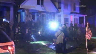 A Chicago sergeant was burned trying to rescue a wheelchair-bound woman from a house fire. (Photo: WGN screenshot)