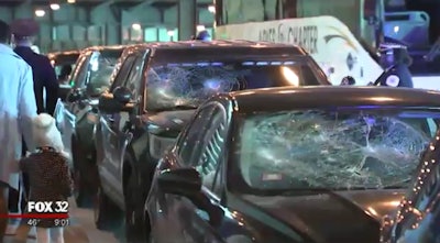 Seven Chicago Police vehicles were vandalized near the Hyatt Regency hotel while a police recognition ceremony was going on inside. (Photo: Fox 32 Chicago screenshot)