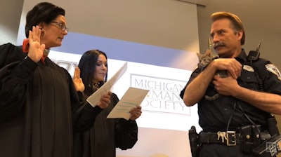 Pawfficer Donut will be used to help raise awareness for pet adoptions and rescues, also interacting with people in the community and on social media. (Photo: Michigan Live screenshot)