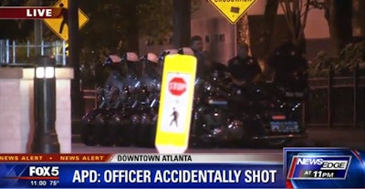 An Atlanta police officer was recovering Thursday after an accidental shooting. Photo: Fox 5 Atlanta screenshot.