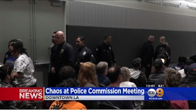 A woman reportedly threw ashes on LAPD Chief Charlie Beck during a Tuesday meeting.