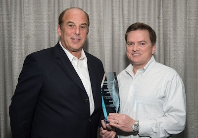 Elbeco’s President & CEO David Lurio (left) and Vice President of Sales and Marketing David Burnette (right) receiving the NAUMD's Best Public Safety Product Innovation Award. (Photo: Elbeco)