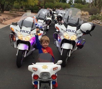 The Phoenix Police Department took to Facebook to share a photo of one of its young supporters who wanted to join the motorcade for Vice President Mike Pence. The young boy, clad in a Superman costume, posed for a picture on his very own mini 'police motorcycle.' (Photo: Phoenix PD/Facebook)