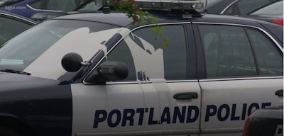 Authorities say paint was dumped on 22 Portland Police vehicles early Tuesday. (Photo: KGW Screen Shot)