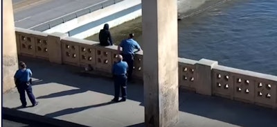 St. Paul Police Chief Todd Axtell and two officers rescue woman from bridge. (Photo: YouTube Screen Shot)