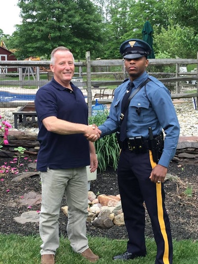 Retired Piscataway Police Officer Matthew Bailly was recently stopped by New Jersey Trooper Michael Patterson. Bailly helped deliver Michael Patterson in 1991. (Photo: New Jersey State Police)