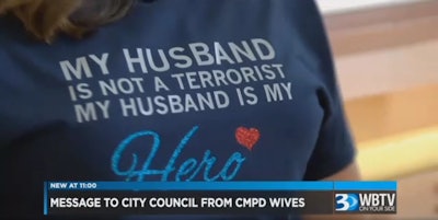 Wives of Charlotte-Mecklenburg police officers attended a Charlotte City Council meeting to protest a councilwoman's anti-police tweet.