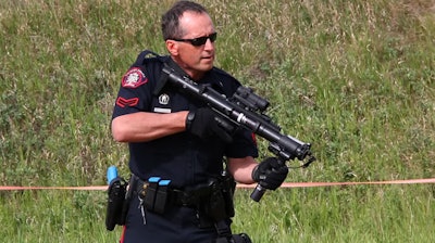 A Calgary officer trains with the 37mm ARWEN ACE-T less-lethal launcher.
