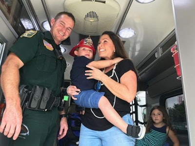 Deputy Jason Hickman's actions saved Dominic when he was a baby, his mom says. Photo: tcpalm.com/Karla Mancini