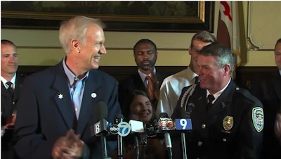 Illinois Governor Bruce Rauner honors Dixon Officer Mark Dallas. Dallas prevented a school attack at the high school where he serves as an SRO.