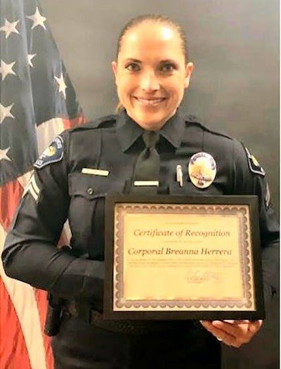 Corporal Breanna Herrera was honored with a Certificate of Recognition for rescuing two young children locked inside a hot car. Image courtesy of Redlands PD / Facebook.