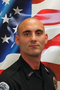 Officer Adam Jobbers-Miller was reportedly responding to a call at a gas station when a gunman opened fire on him. He is now listed in critical but stable condition. Image courtesy of Fort Myers PD / Facebook.