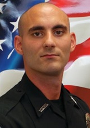 Officer Adam Jobbers-Miller was killed with his own gun, according to a new report. (Photo: Fort Myers PD)