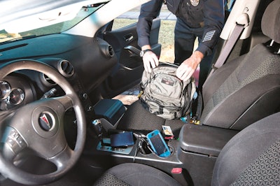 When searching vehicles, always wear proper gloves to protect yourself from fentanyl exposure. (Photo courtesy Police File)