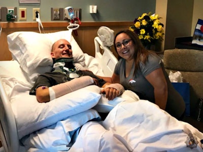 Erica Limon — a Denver 911 Communications Center dispatcher and certified EMT — was recently reunited with Lakewood Police Officer Mark O’Donnell — who she had aided after a traffic crash. (Photo: Denver PD/Facebook)