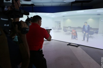Miami Police Officer L. Gonzalez demonstrates FATS 300LE for media. (Photo courtesy of Miami Police Department)