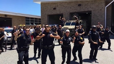 Screen grab of the Norfolk (VA) Police Department's version of the Bruno Mars song 'Uptown Funk.' Image courtesy of Norfolk PD / Facebook.